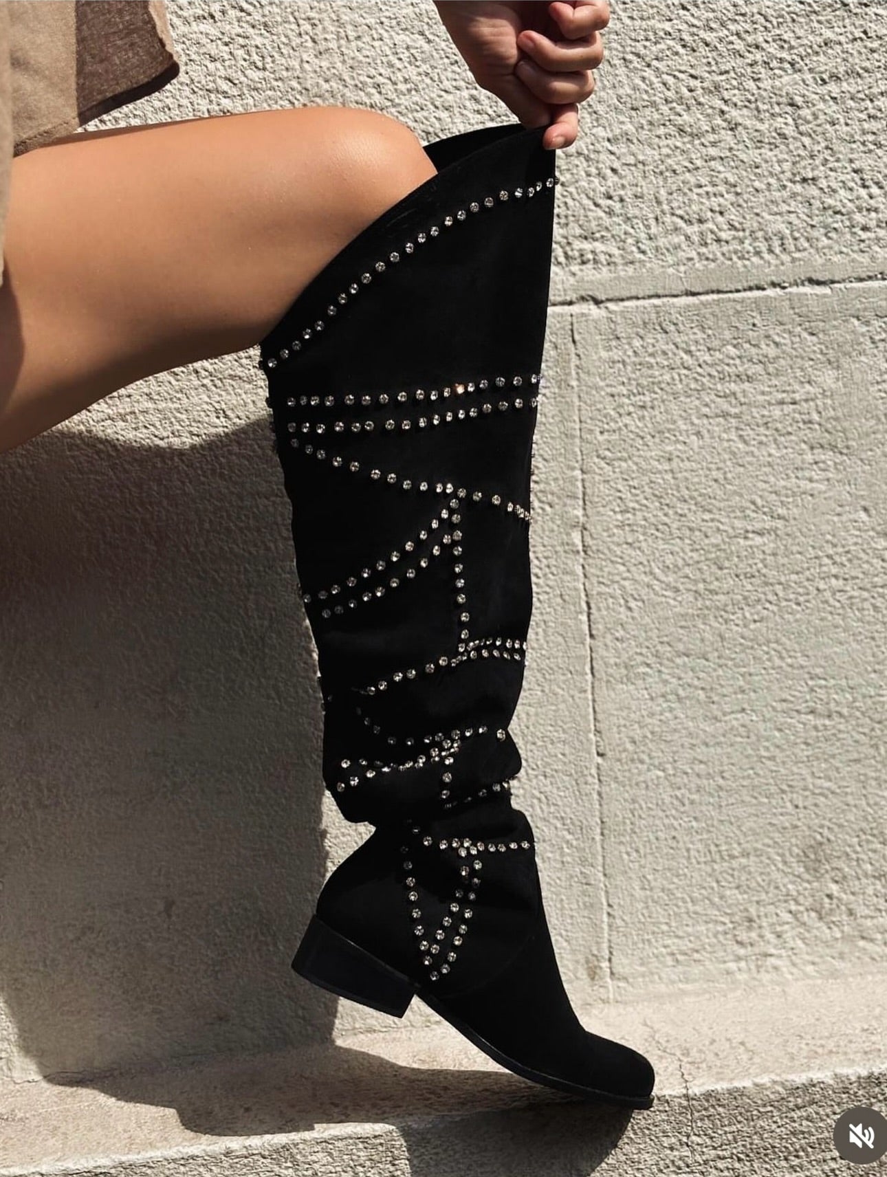 Sparkling diamond wrapped horseshoe bottom high top boots
